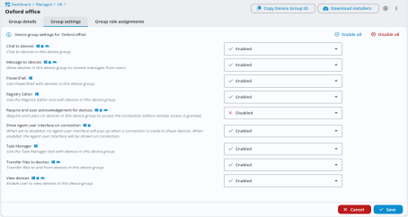 Device group settings page for the Cambridge office. A list of features such as chat, PowerShell, Registry Editor and Task Manager are shown, with drop-downs set to either Enabled or Disabled. All features are enabled except Require end user acknowledgement for devices, which is disabled. Enable all and Disable all icons are in the top right and Cancel and Save buttons appear at the bottom.